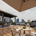 Rooftop Garden Landscape With Wooden Deck Gazebo Wicker Furniture Green Plants And Flowers